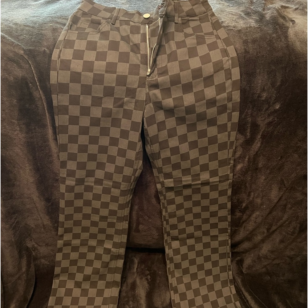 Dressed in LaLa black checkered pants